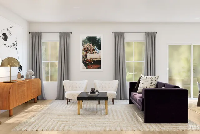 a living room with a couch and a rug