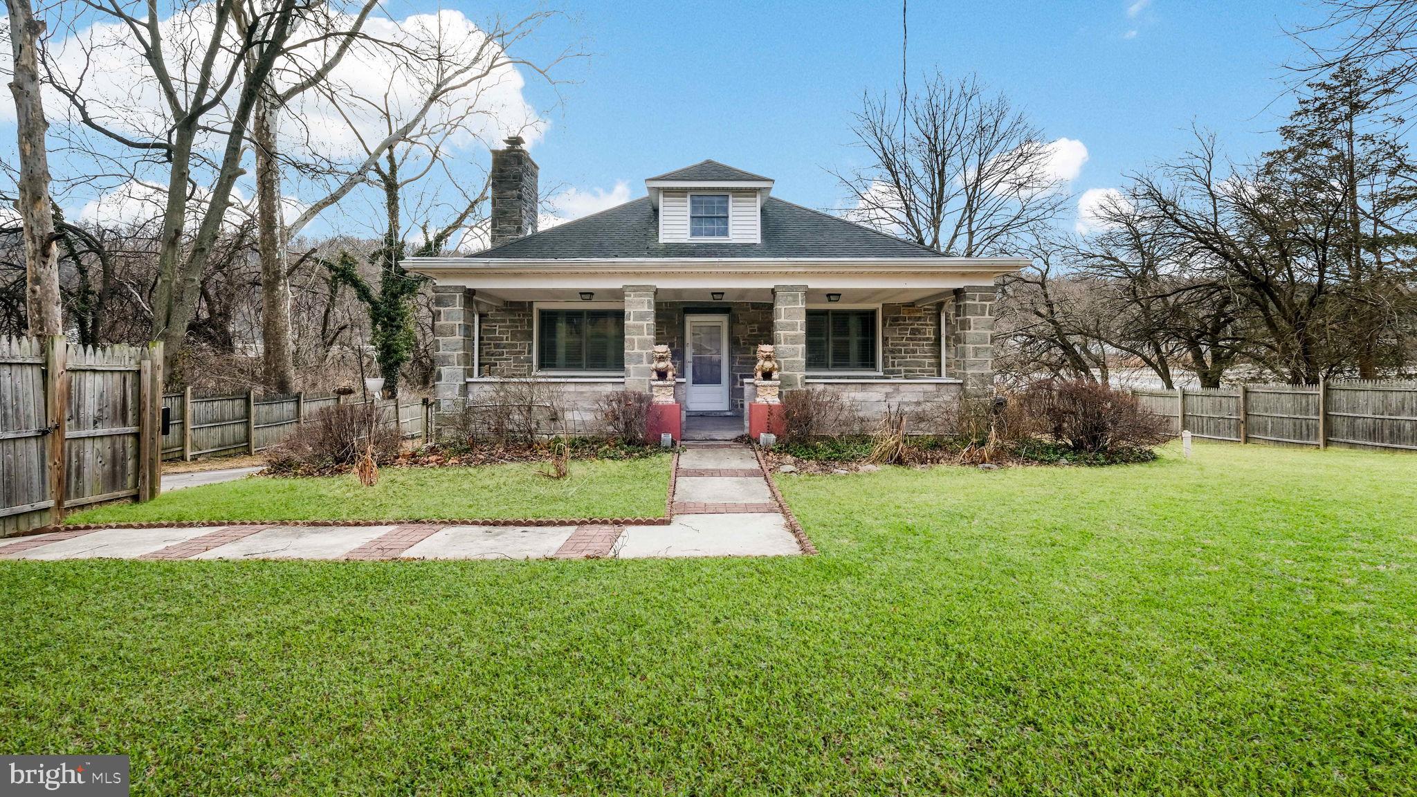 459 South Gulph Road King of Prussia, PA 19406 - Photo 1 of 43 Charming stone home with lush green lawn.