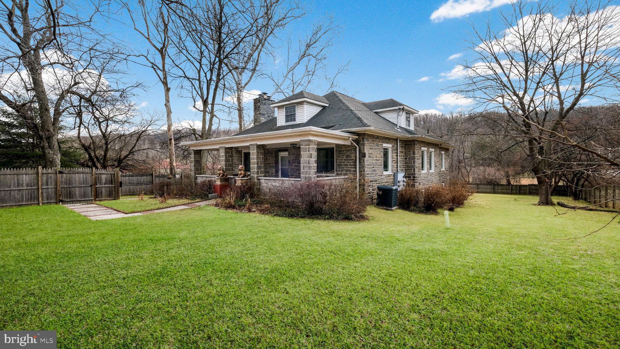 459 South Gulph Road King of Prussia, PA 19406 - Photo 2 of 43 Charming stone home with lush green yard.
