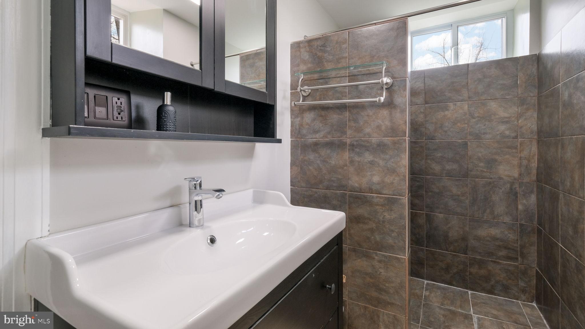 459 South Gulph Road King of Prussia, PA 19406 - Photo 34 of 43 Sleek modern bathroom with elegant finishes.