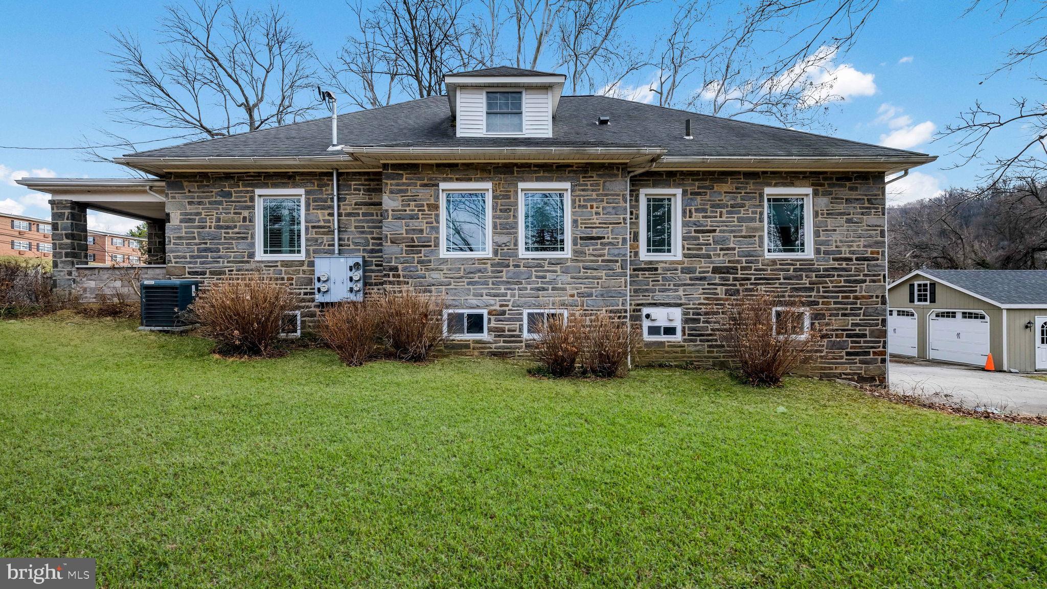 459 South Gulph Road King of Prussia, PA 19406 - Photo 35 of 43 Charming stone home with lush green yard.