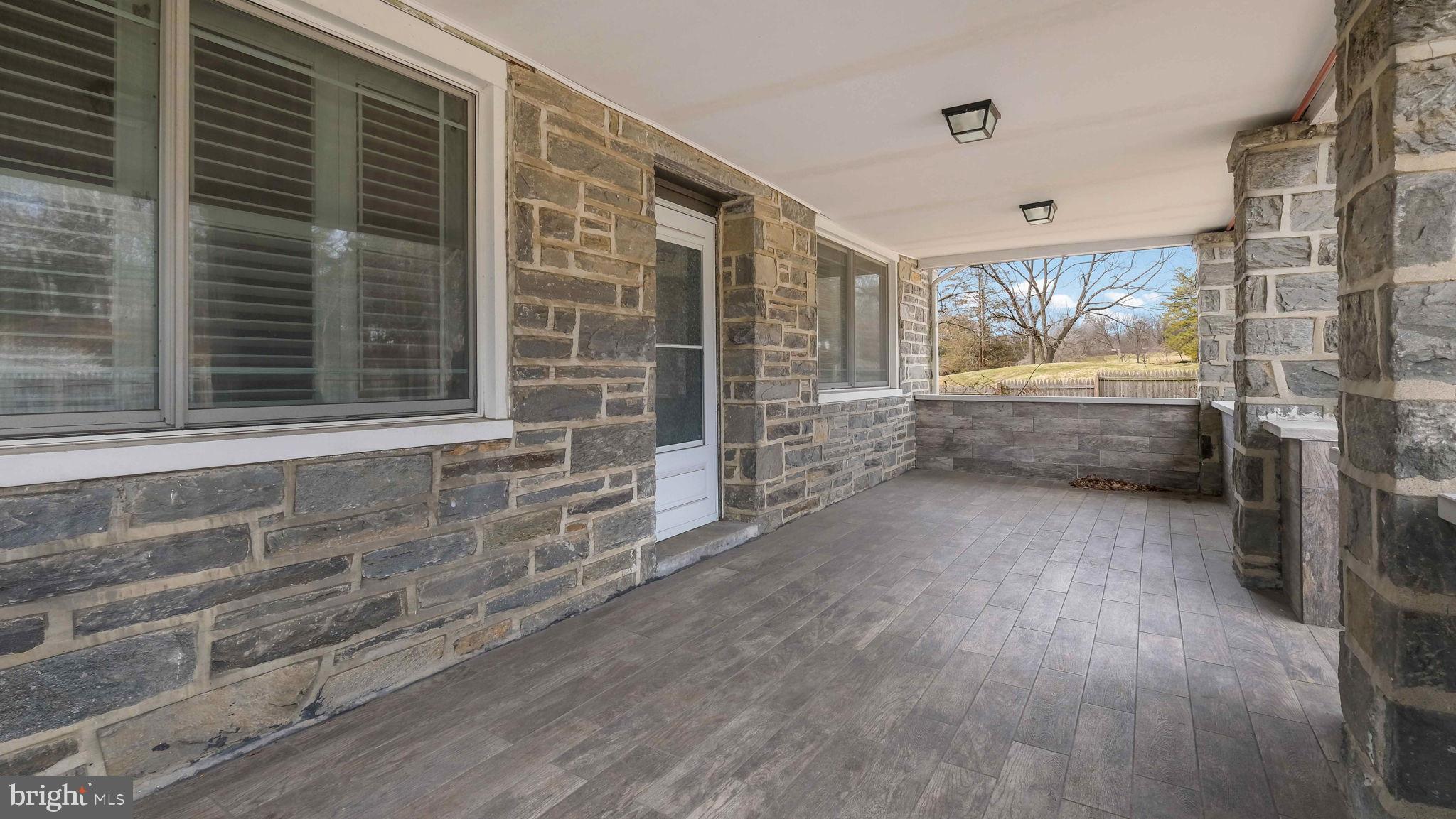 459 South Gulph Road King of Prussia, PA 19406 - Photo 5 of 43 Charming stone porch with serene views.