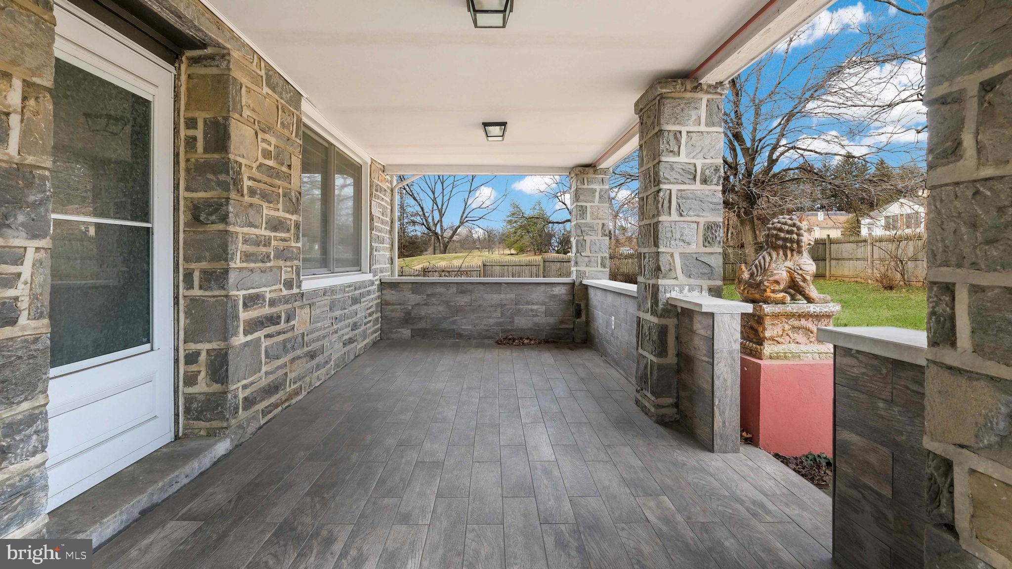 459 South Gulph Road King of Prussia, PA 19406 - Photo 6 of 43 Charming porch with stone accents and views.