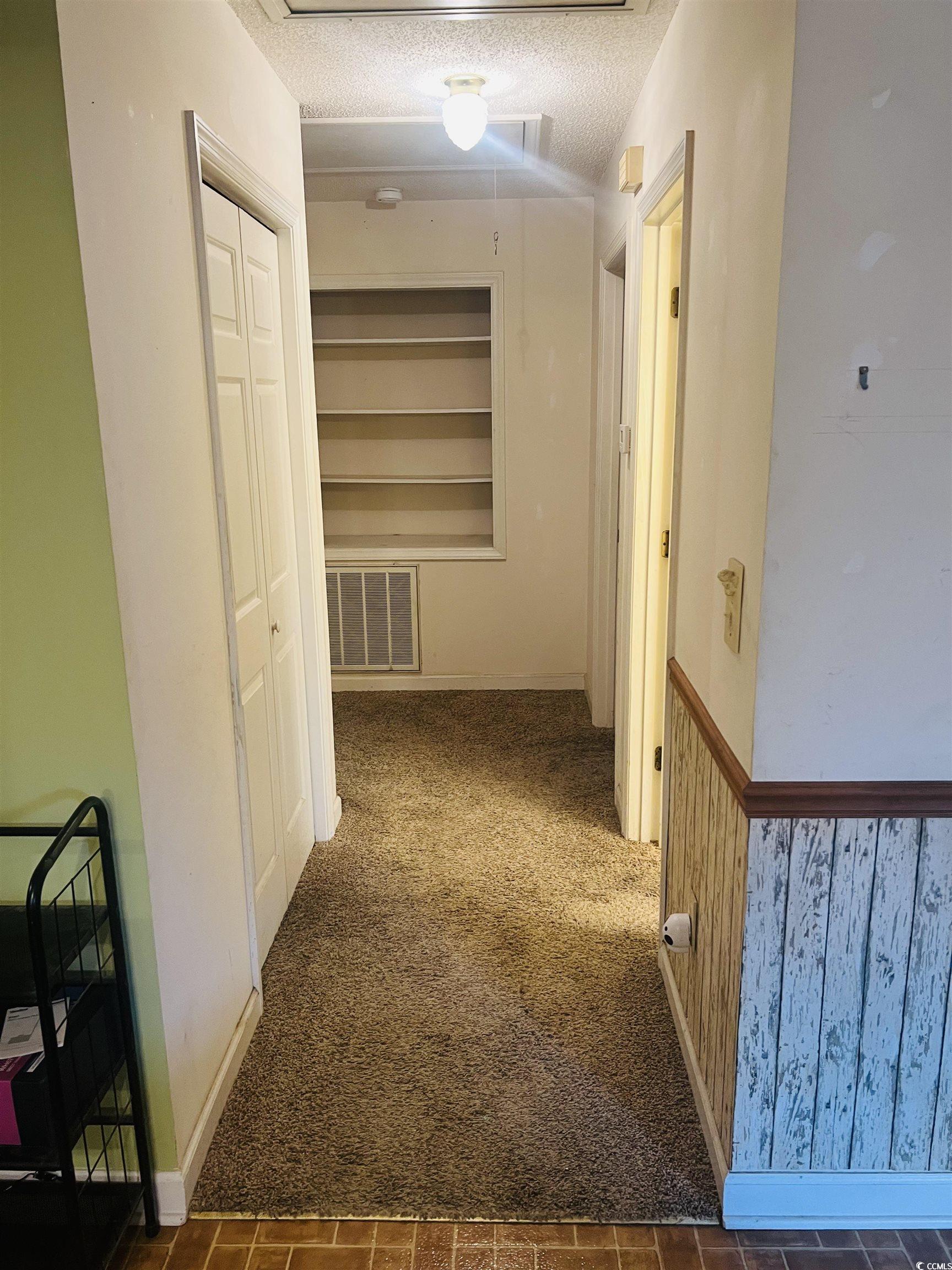 664 4 Mile Loop Cheraw, SC 29520 - Photo 14 of 27 Hallway featuring a textured ceiling, visible vent