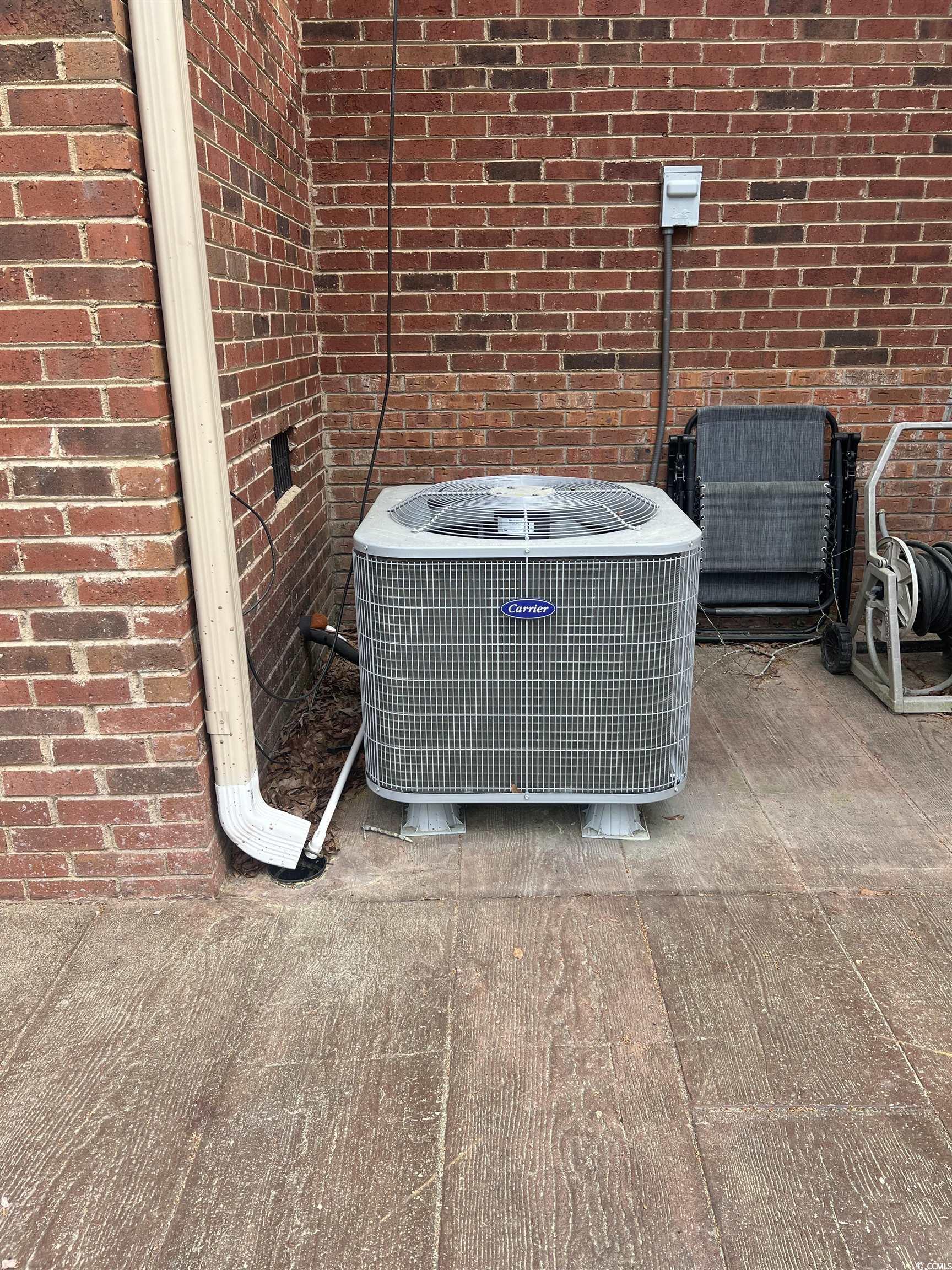 664 4 Mile Loop Cheraw, SC 29520 - Photo 22 of 27 Details with brick siding and central AC