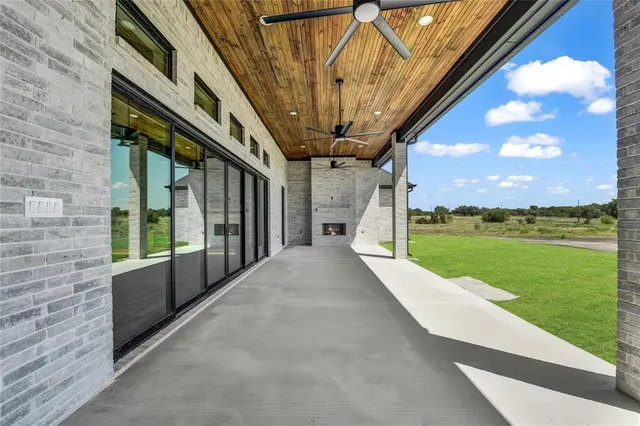 a view of swimming pool with a yard