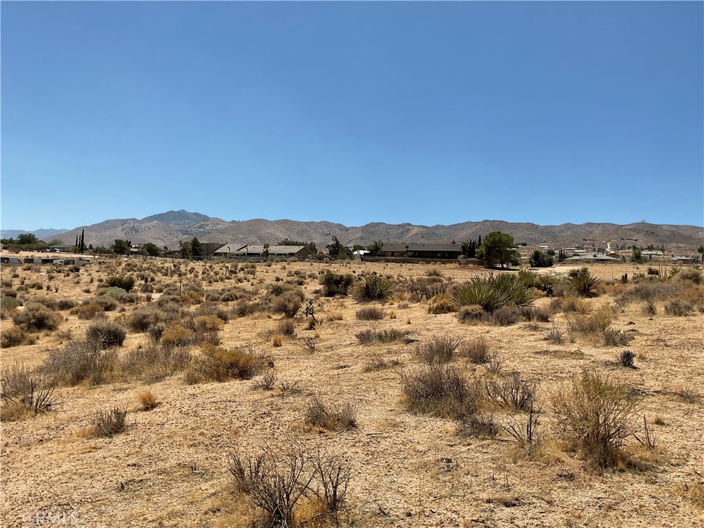 7 Ocotillo Way Apple Valley, CA 92308 - Photo 2 of 11 a view of lake and mountain