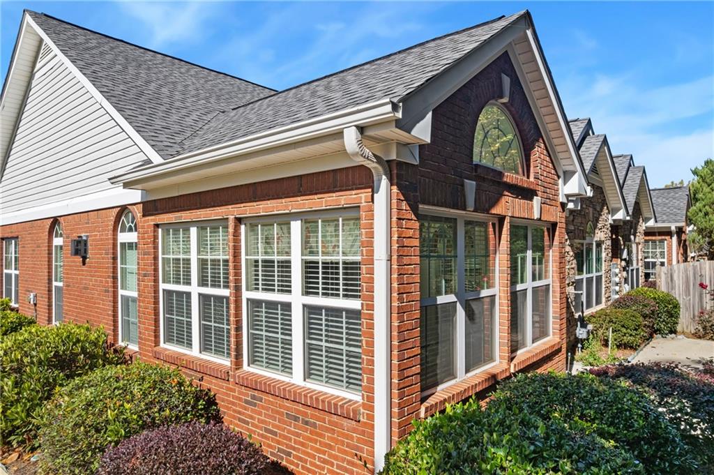 4557 Caleb Crossing Powder Springs, GA 30127 - Photo 6 of 29 a view of a large brick building