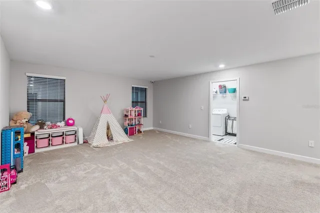 a view of a room with air conditioner duct and equipment