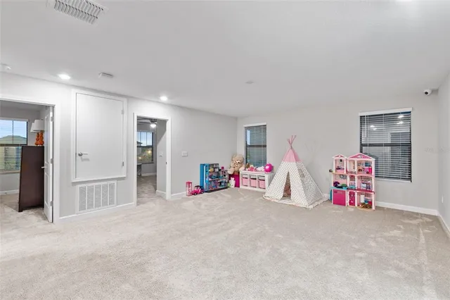 a bath tub sitting next to a shower