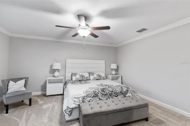 a bathroom with a granite countertop sink a mirror and vanity