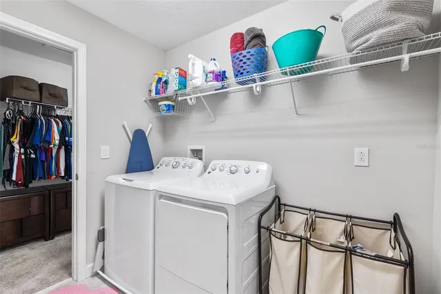 a view of kitchen cabinets a sink and dishwasher