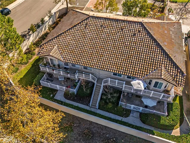 a view of a brick house with a street