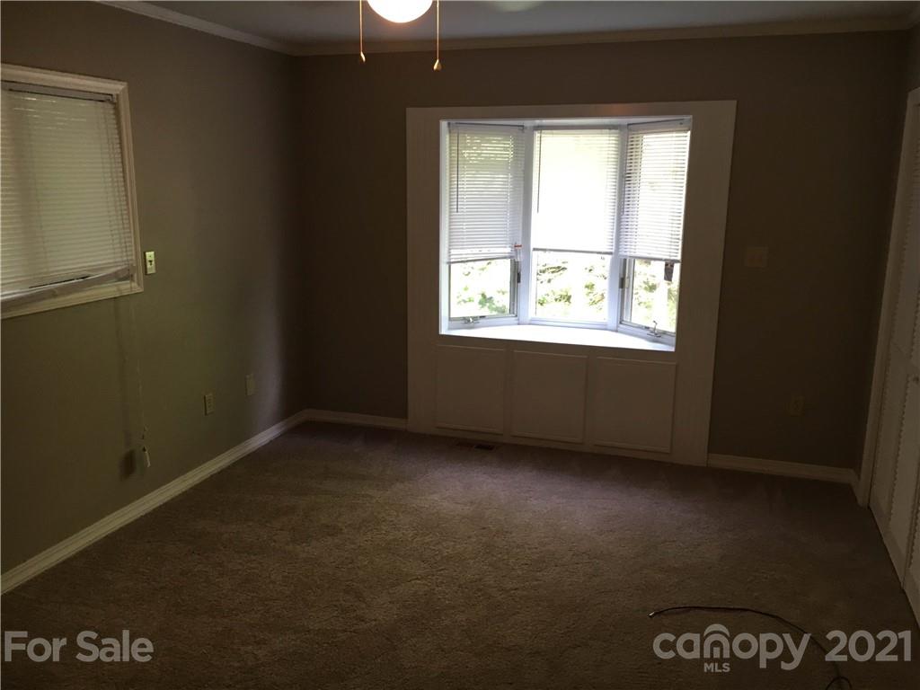 21 Sitton Road Sylva, NC 28779 - Photo 12 of 16 an empty room with a window