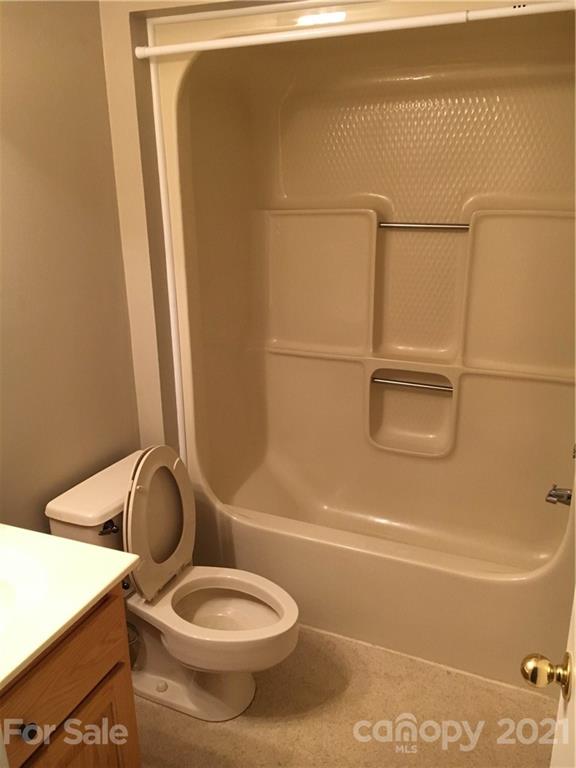 21 Sitton Road Sylva, NC 28779 - Photo 10 of 16 a bathroom with a toilet and a shower