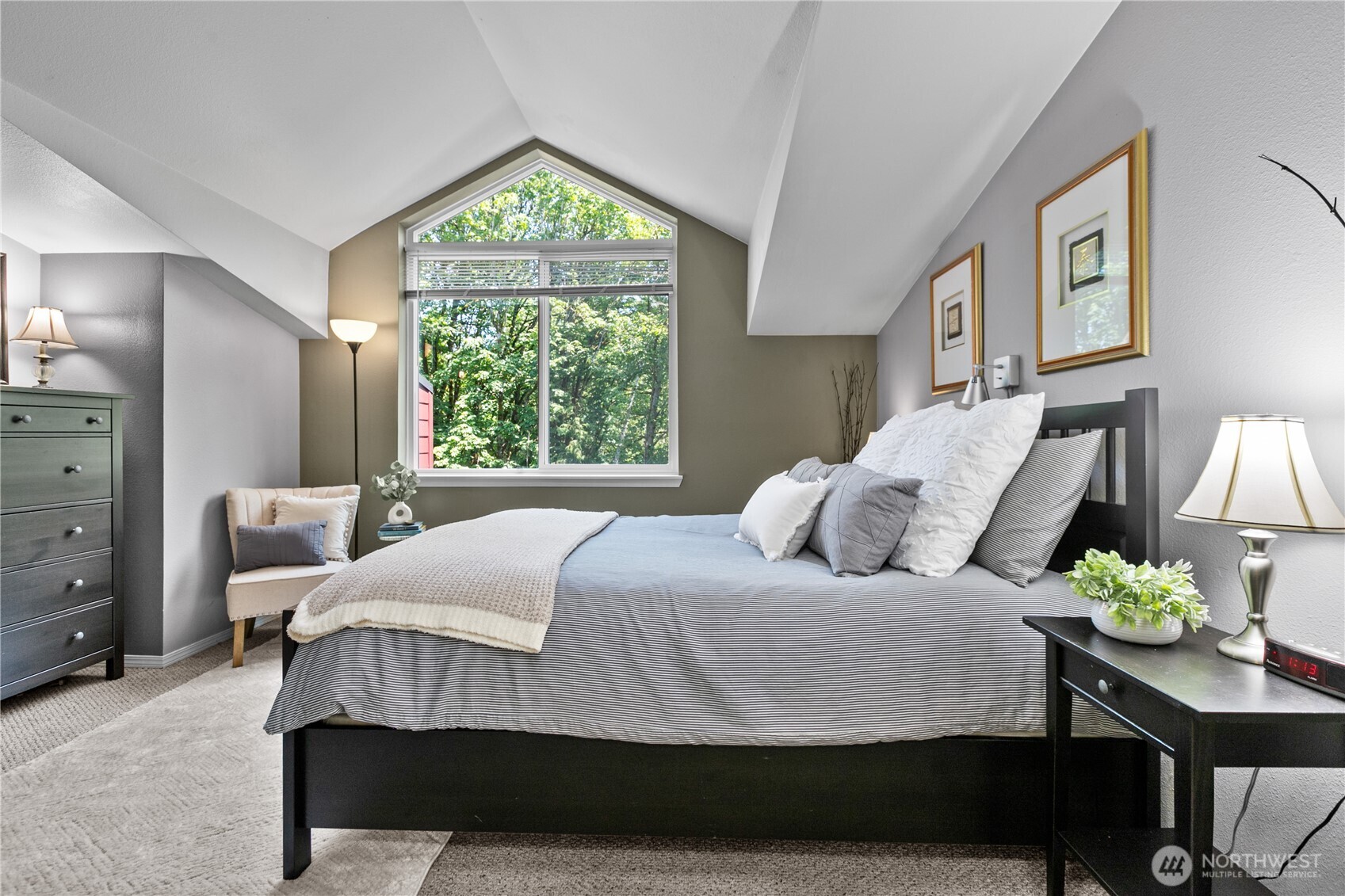 16019 Waynita Way Northeast, Unit F207 Bothell, WA 98011 - Photo 18 of 39 a bedroom with a bed window and table