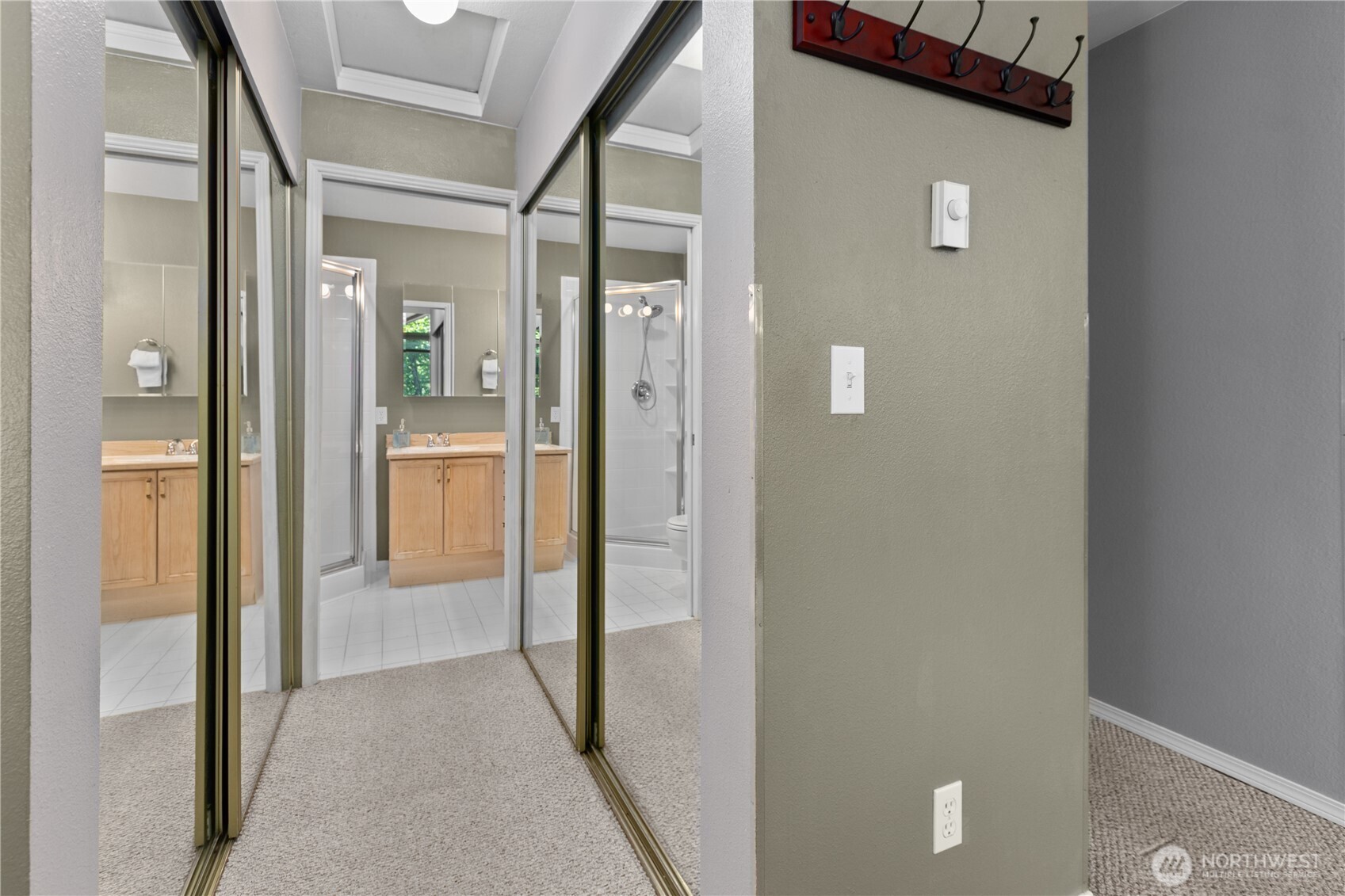16019 Waynita Way Northeast, Unit F207 Bothell, WA 98011 - Photo 20 of 39 a view of a bathroom from the hallway