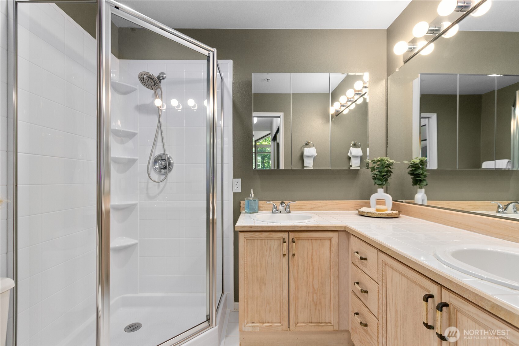 16019 Waynita Way Northeast, Unit F207 Bothell, WA 98011 - Photo 21 of 39 a bathroom with a sink and a mirror