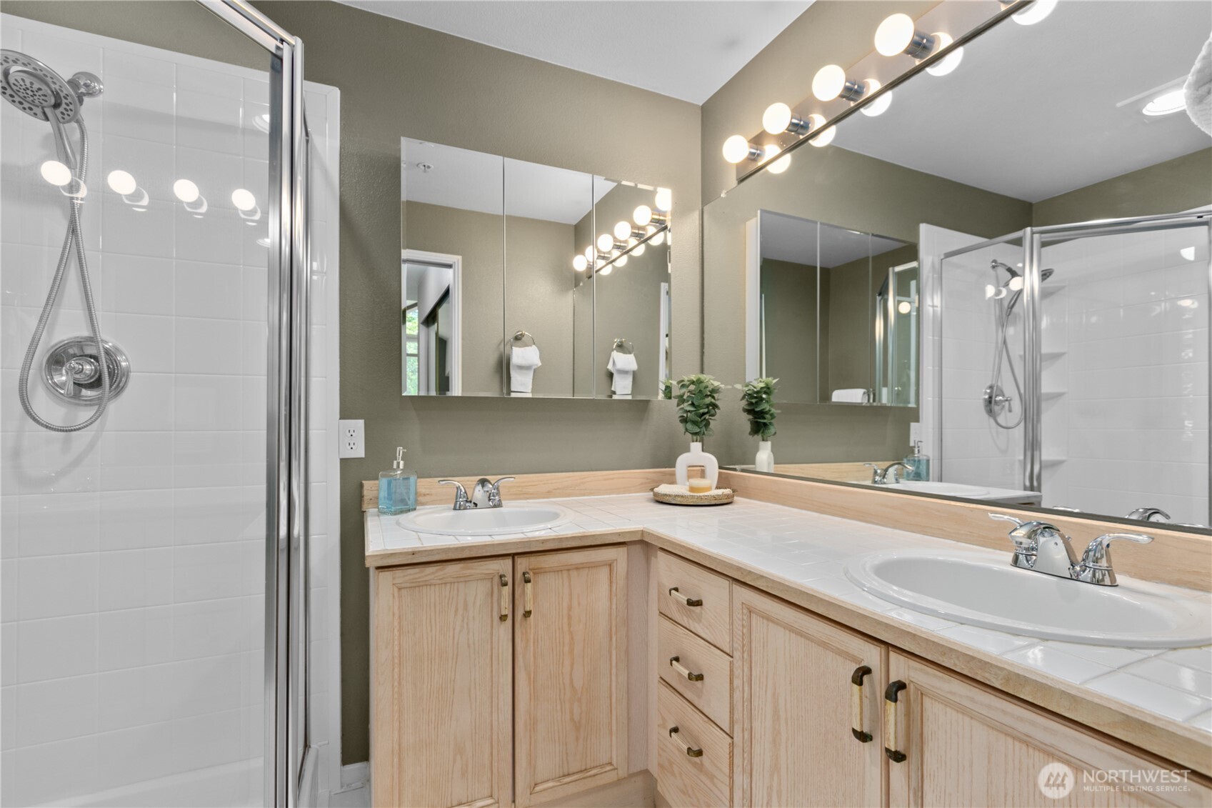 16019 Waynita Way Northeast, Unit F207 Bothell, WA 98011 - Photo 22 of 39 a bathroom with a sink and a mirror