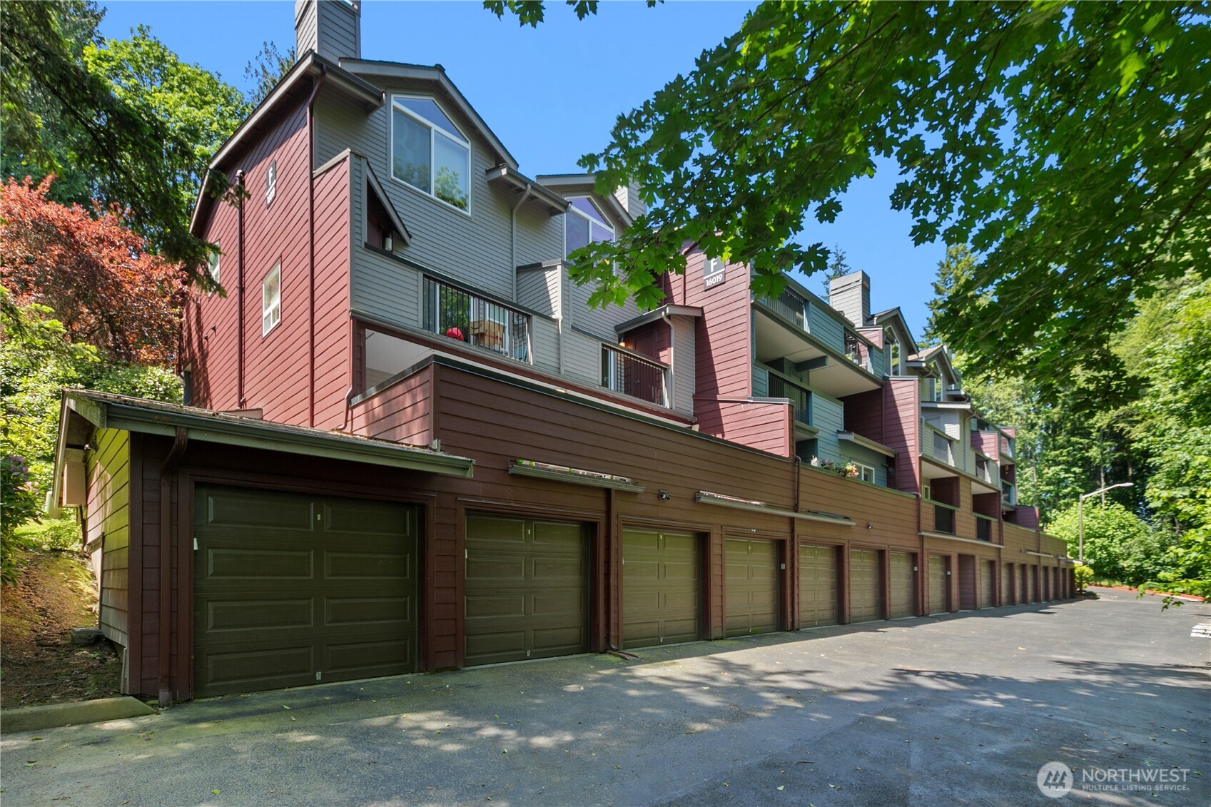 16019 Waynita Way Northeast, Unit F207 Bothell, WA 98011 - Photo 26 of 39 a view of a house with a garage