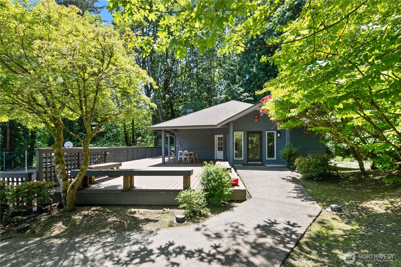 16019 Waynita Way Northeast, Unit F207 Bothell, WA 98011 - Photo 29 of 39 a front view of a house with a yard