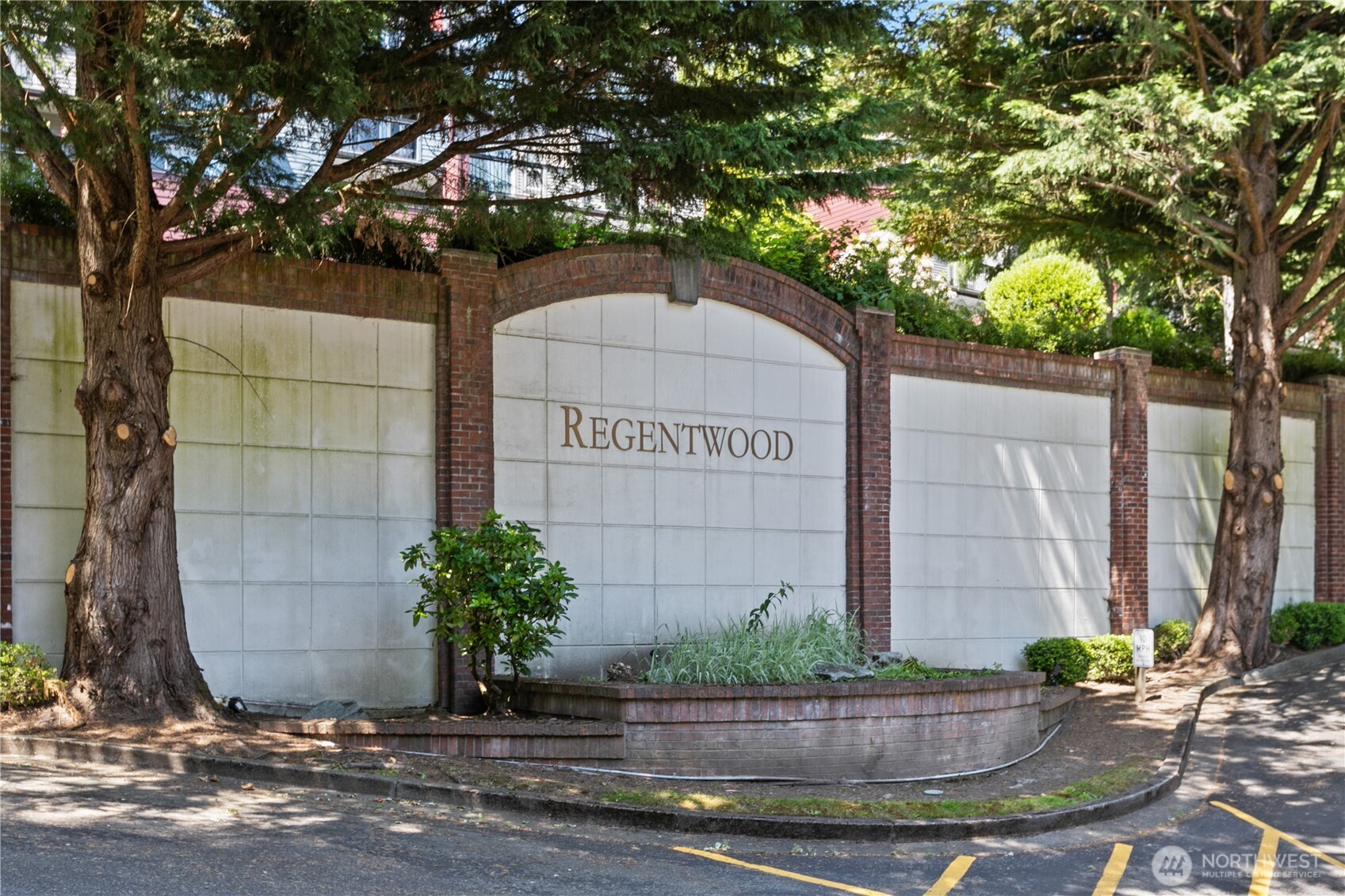 16019 Waynita Way Northeast, Unit F207 Bothell, WA 98011 - Photo 38 of 39 a sign that is sitting in front of a house
