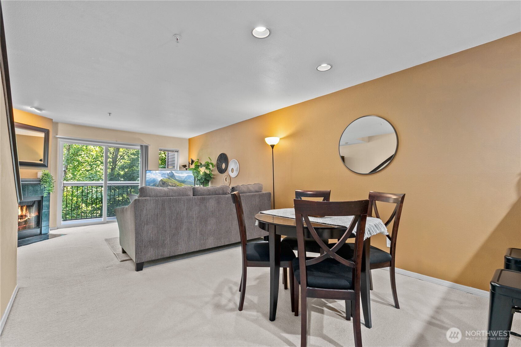 16019 Waynita Way Northeast, Unit F207 Bothell, WA 98011 - Photo 10 of 39 a view of a dining room with furniture and a large window