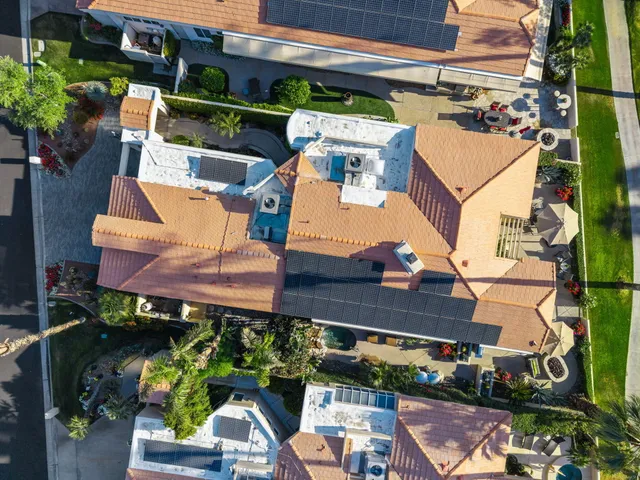 an aerial view of a house with a garden