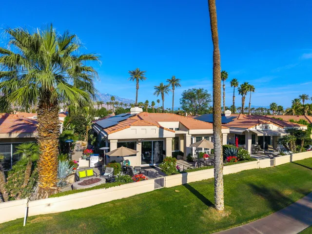 a view of a street with sitting area