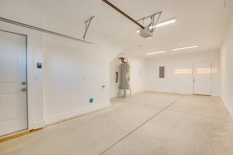a view of a livingroom with a ceiling fan and window