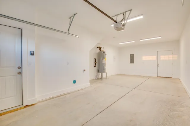 a view of a livingroom with a ceiling fan and window