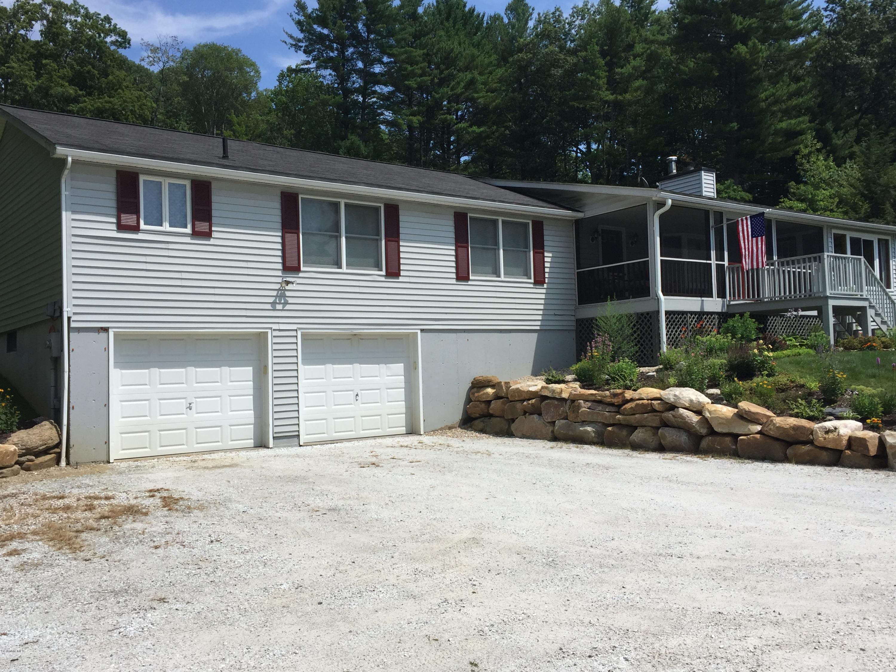 181 Bunce Road South Sheffield, MA 01222 - Photo 15 of 22 a view of a house with a garden and pathway