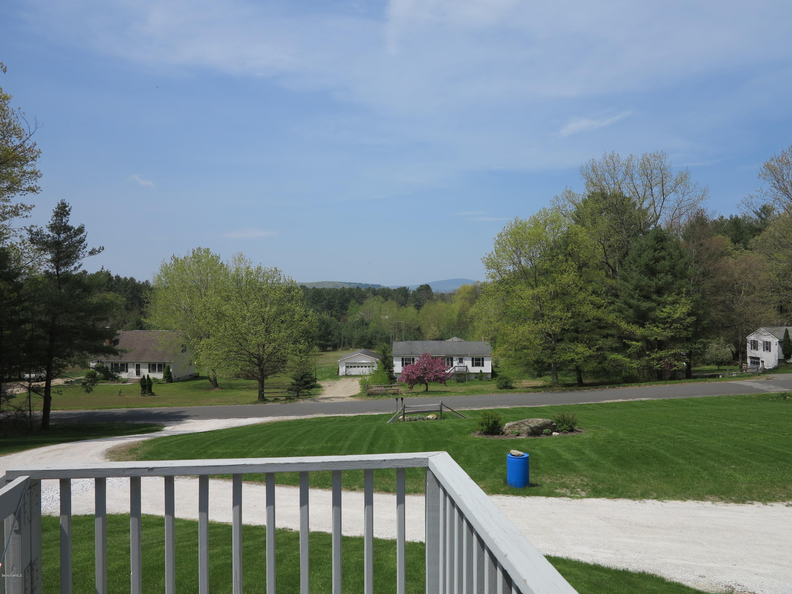 181 Bunce Road South Sheffield, MA 01222 - Photo 19 of 22 a view of a street with a houses in the background