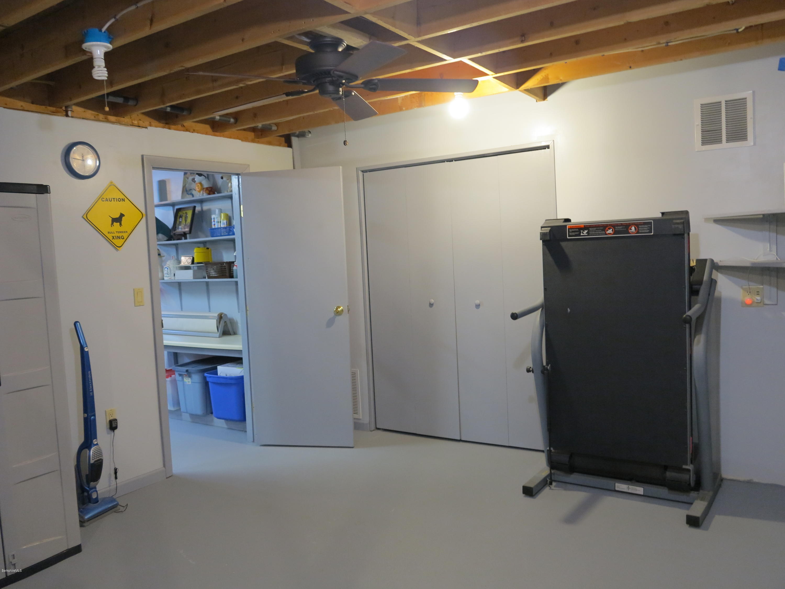 181 Bunce Road South Sheffield, MA 01222 - Photo 20 of 22 a view of storage and utility room with refrigerator and toys