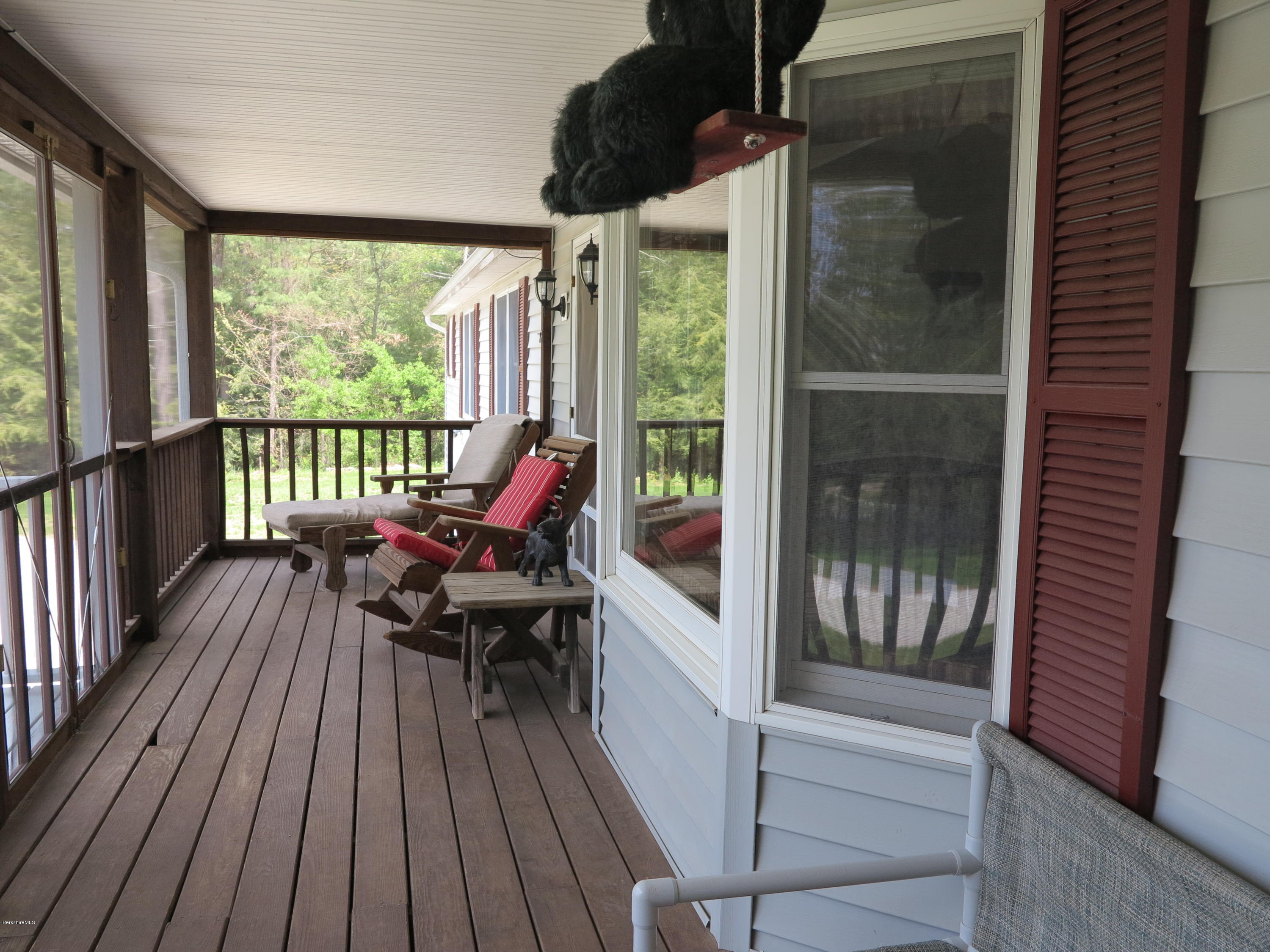 181 Bunce Road South Sheffield, MA 01222 - Photo 4 of 22 a view of a balcony with couch
