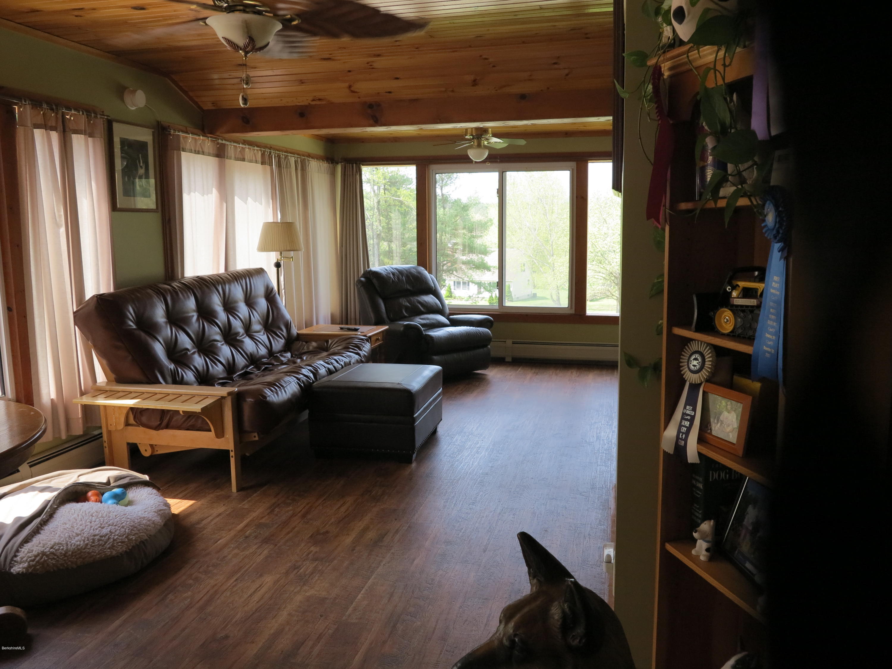 181 Bunce Road South Sheffield, MA 01222 - Photo 9 of 22 a living room with furniture fireplace and a large window