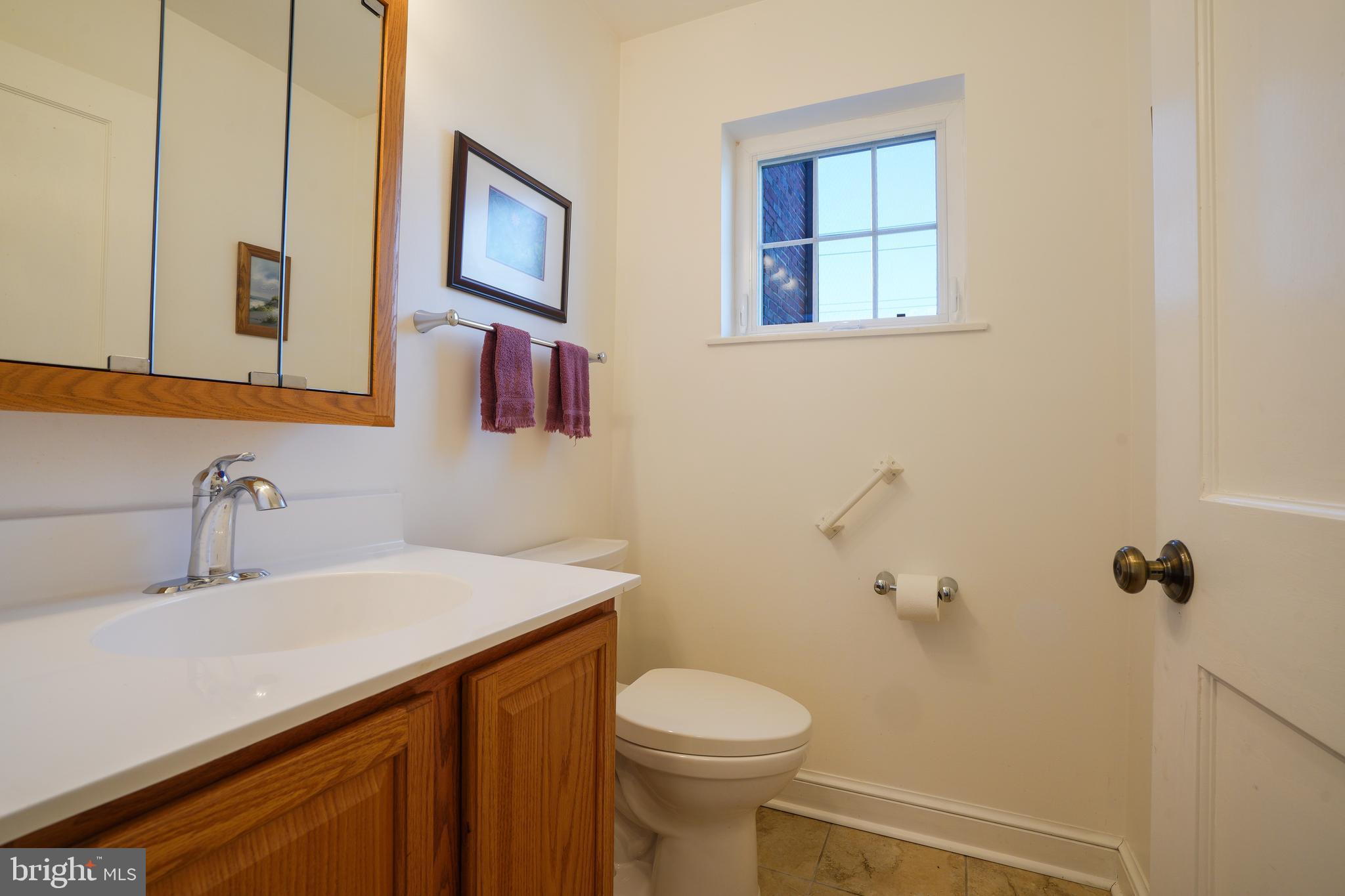 6339 Frederick Road Baltimore, MD 21228 - Photo 17 of 33 Half bath off of kitchen