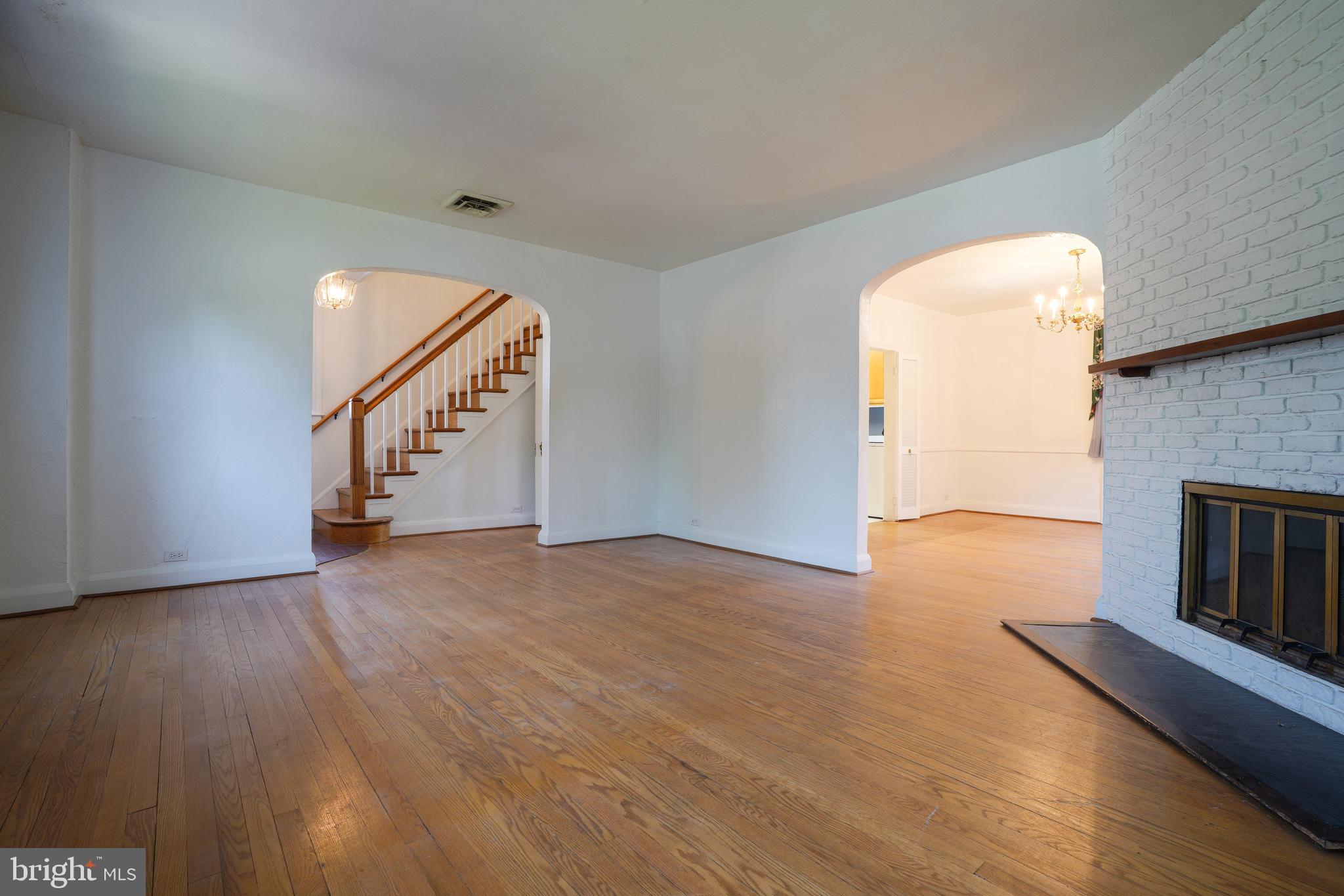 6339 Frederick Road Baltimore, MD 21228 - Photo 8 of 33 Living room & dining room w charming archways
