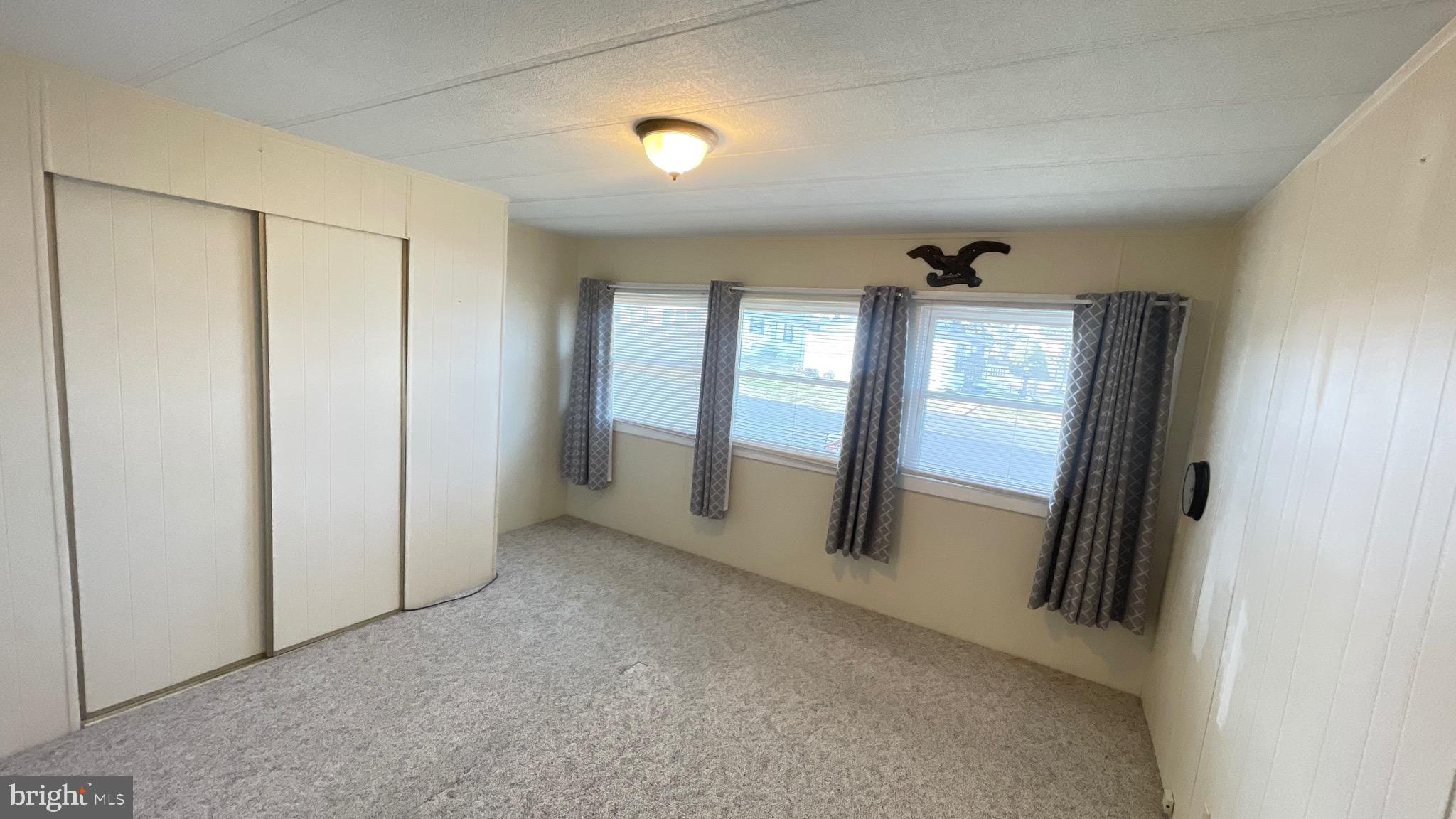 461 Running Brook Road North Wales, PA 19454 - Photo 16 of 19 an empty room with windows and closet