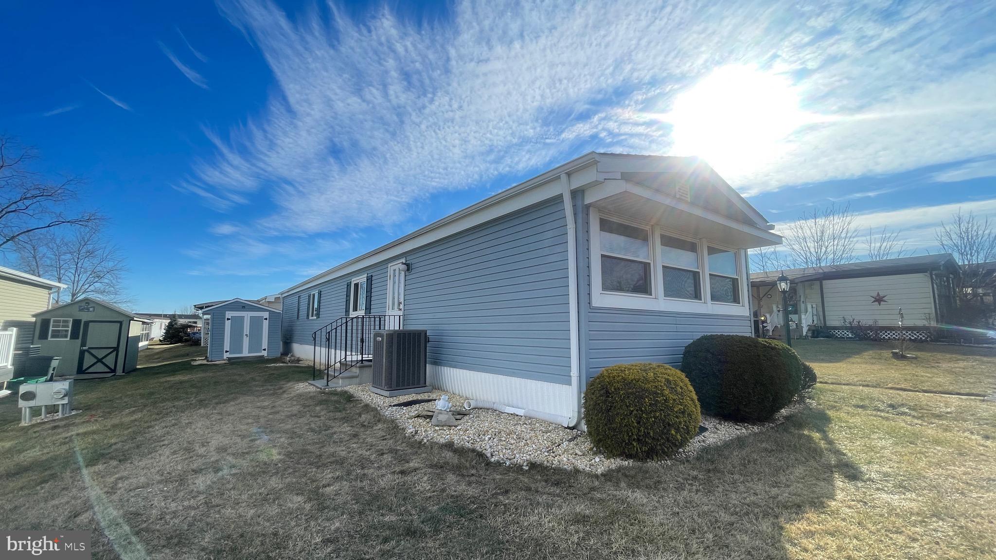 461 Running Brook Road North Wales, PA 19454 - Photo 3 of 19 a view of a back yard of the house
