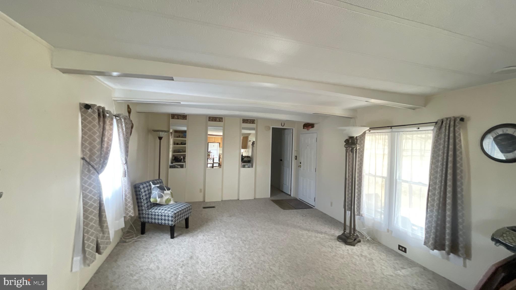 461 Running Brook Road North Wales, PA 19454 - Photo 7 of 19 a view of a room with window and a livingroom