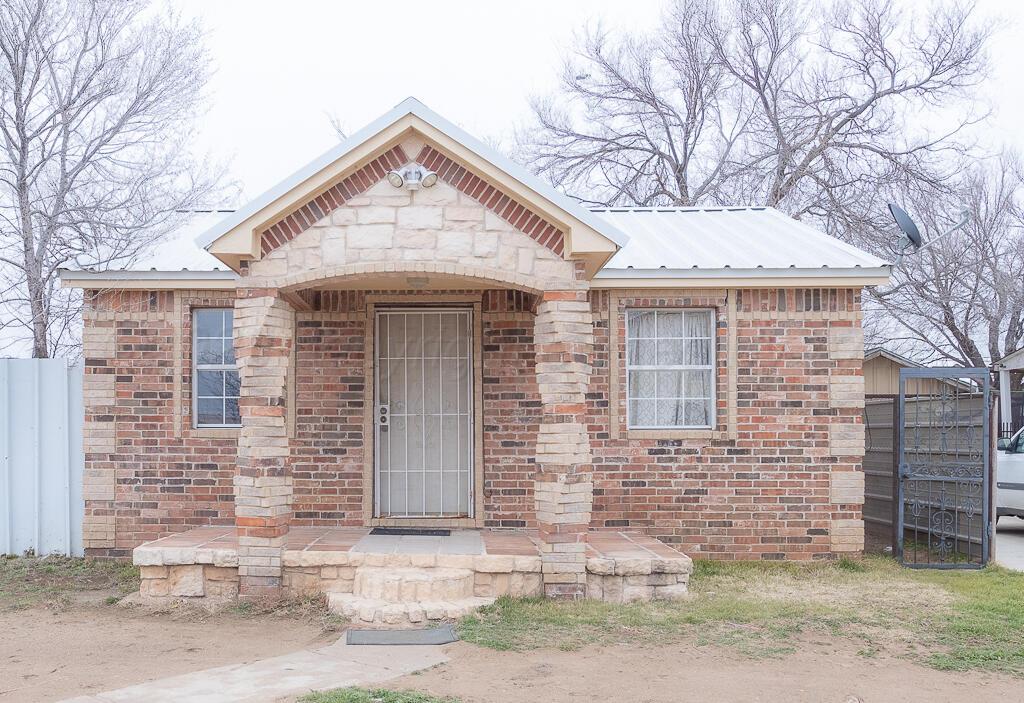 2501 Spruce Street Amarillo, TX 79103 - Photo 1 of 15 a front view of a house with garage
