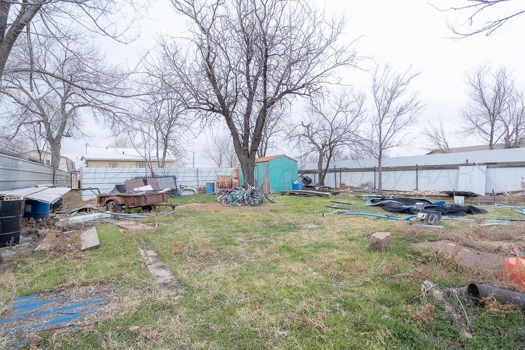 2501 Spruce Street Amarillo, TX 79103 - Photo 12 of 15 a view of a yard with a large tree in it