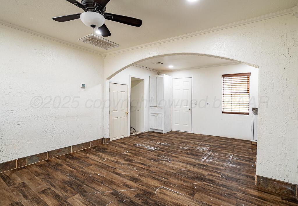 2501 Spruce Street Amarillo, TX 79103 - Photo 2 of 15 a view of empty room with wooden floor