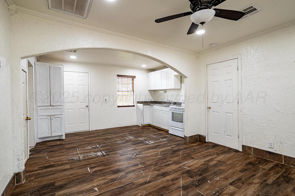 2501 Spruce Street Amarillo, TX 79103 - Photo 3 of 15 a view of a kitchen and empty room
