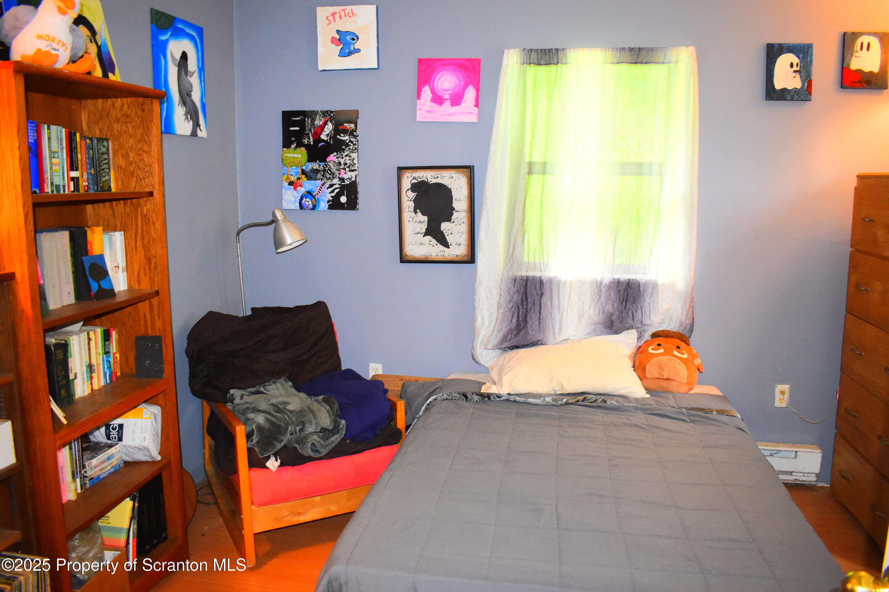 760 State Rte 3021 Springville, PA 18844 - Photo 24 of 26 a bedroom with a bed and a window