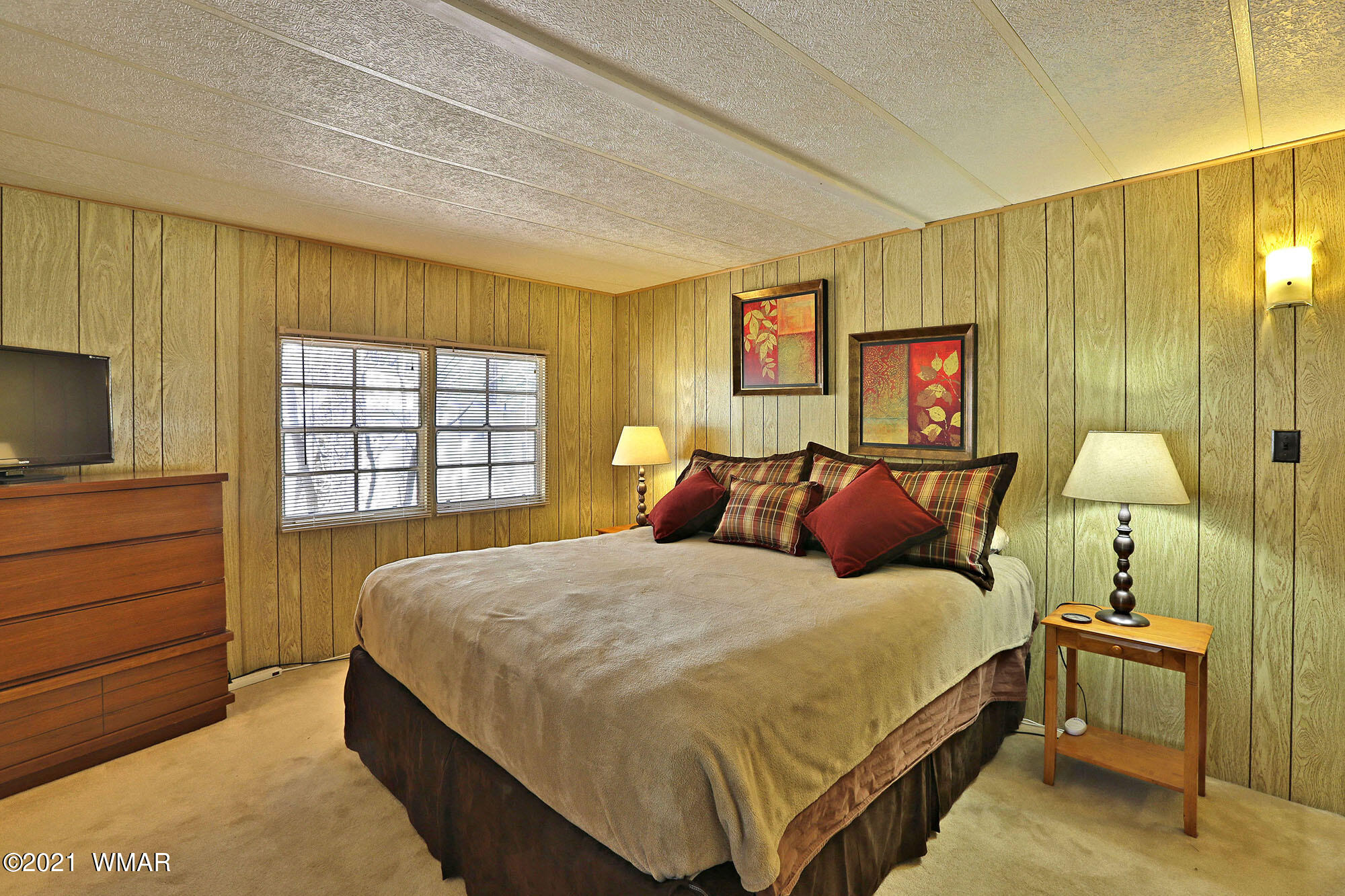 4308 Racoon Court Pinetop, AZ 85935 - Photo 11 of 14 a bedroom with a bed and a window
