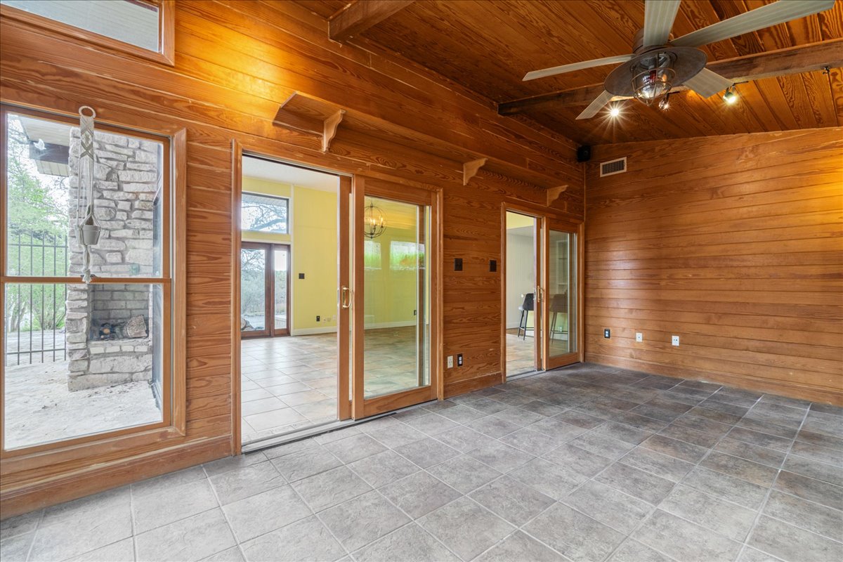 209 Finn Street Austin, TX 78734 - Photo 16 of 40 View of sunroom facing the living room