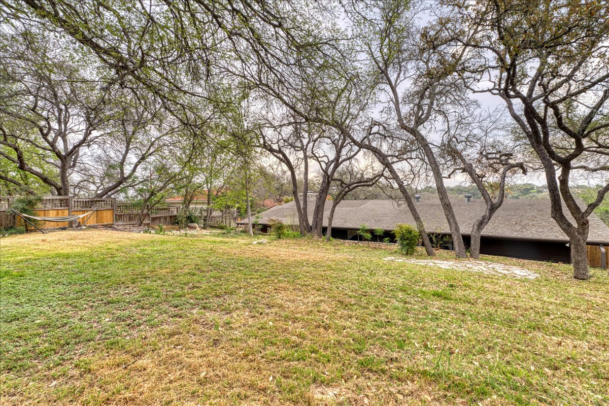 209 Finn Street Austin, TX 78734 - Photo 28 of 40 Mature trees throughout