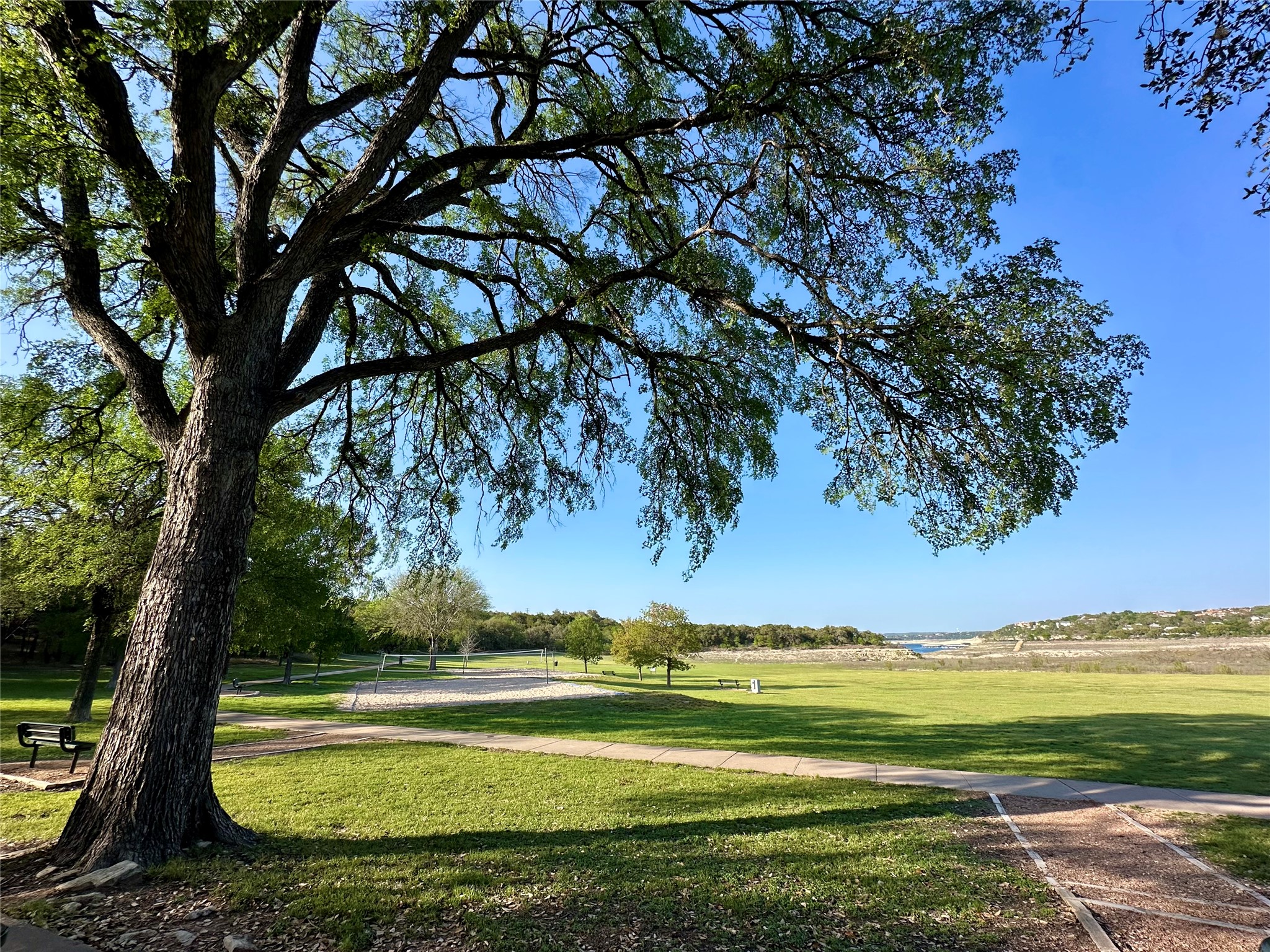 209 Finn Street Austin, TX 78734 - Photo 37 of 40 Lakeway City Park volley ball & trail with peek-a-boo of Lake Travis